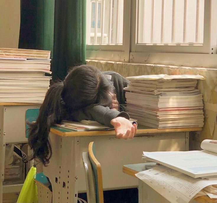 tired girl at school